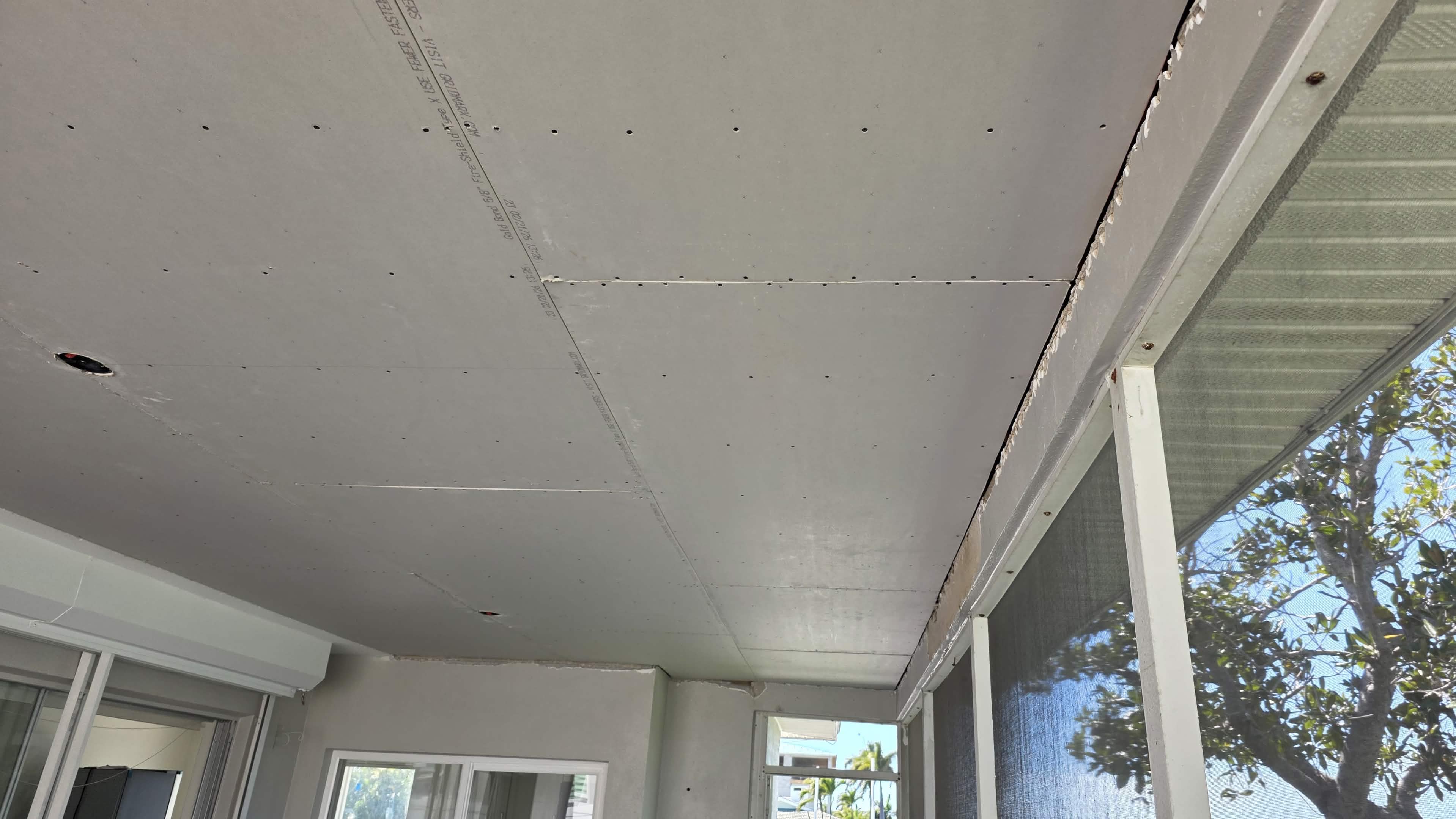 New drywall installed on the patio ceiling
